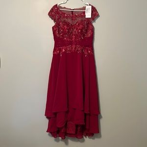 Jj house formal gown new with tags size 12. Burgundy with lace